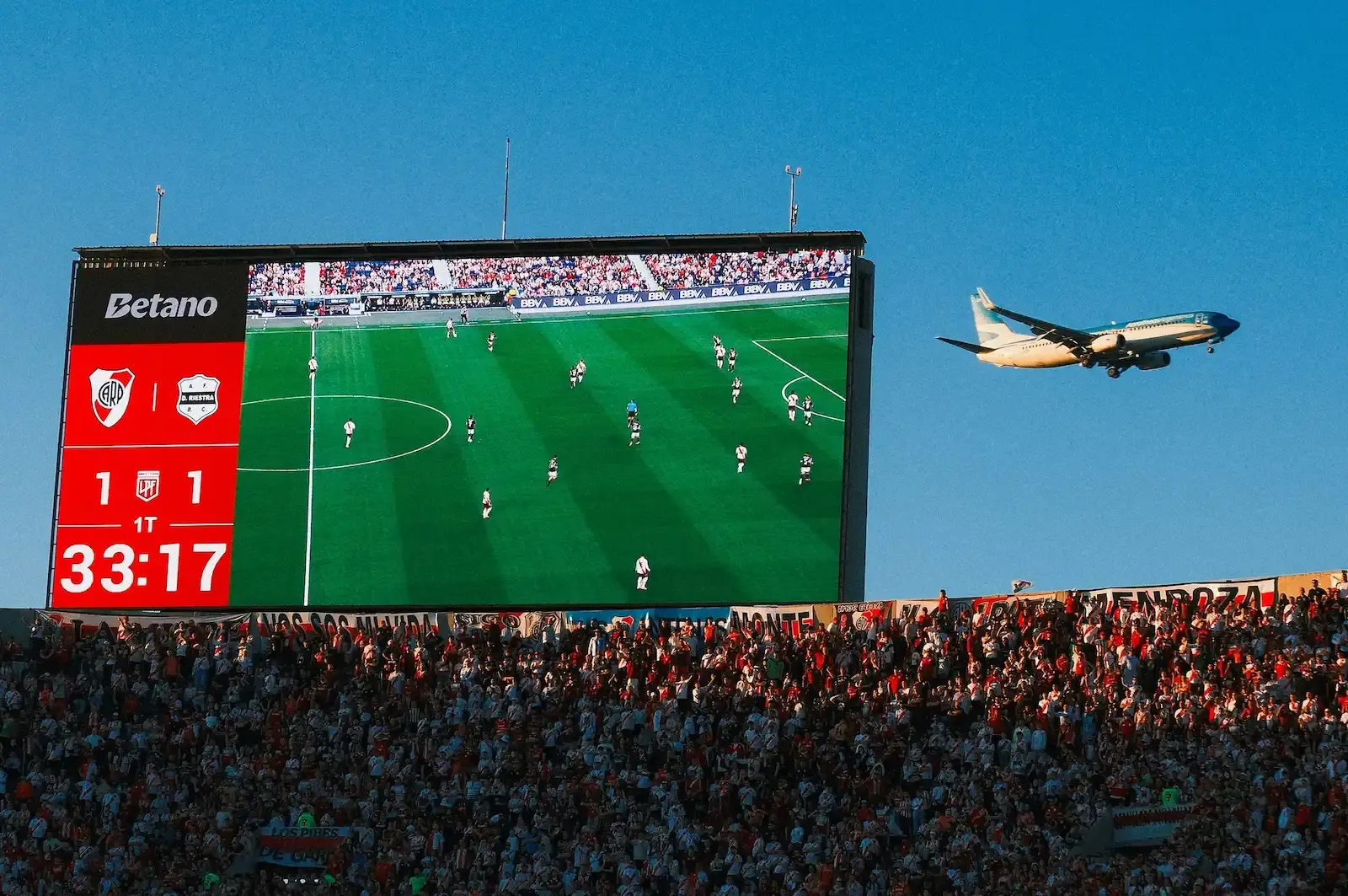 International football match under stadium lights