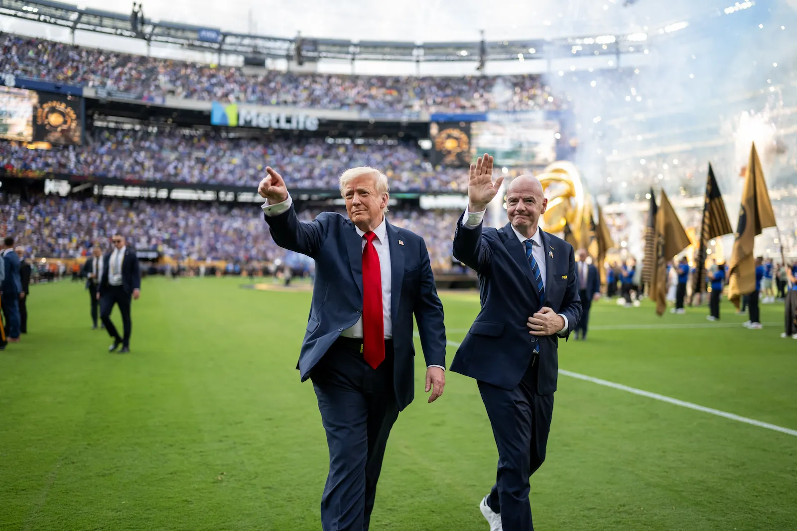 Gianni Infantino and Donald Trump walking the pitch ahead of the 2026 World Cup